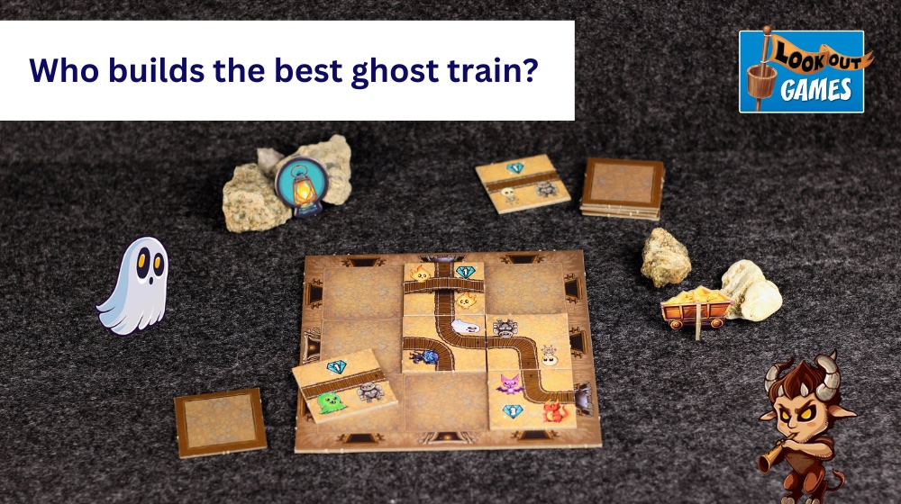 A collage on a picture of a game of Ghosts Galore being played ob a dark grey surface. On is a text saying: Who builds the best ghost train? On the collage as well are illustrations of a satyr and a ghost.